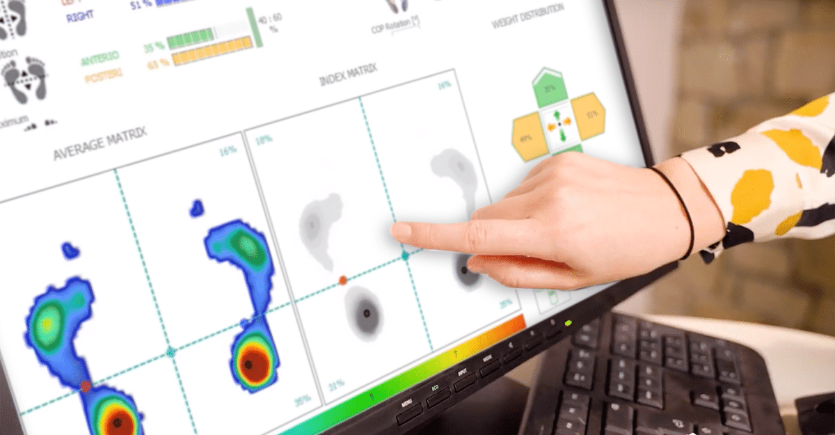 A person points at an FCE Scan heat map analysis on a computer screen, possibly reviewing data or engaging with an interactive dashboard. | FCE Scan